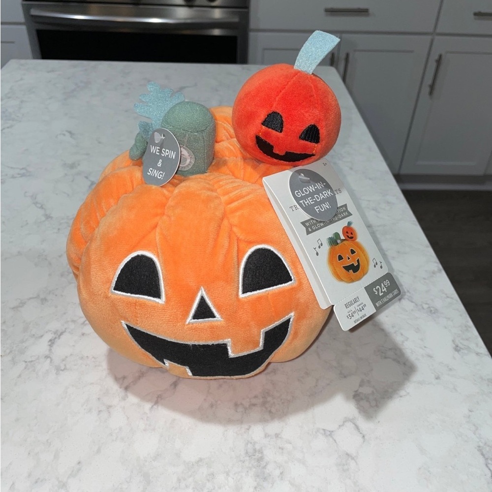 NWT 2023 Hallmark Halloween Glow In The Dark Spin And Sing Pumpkin Plush